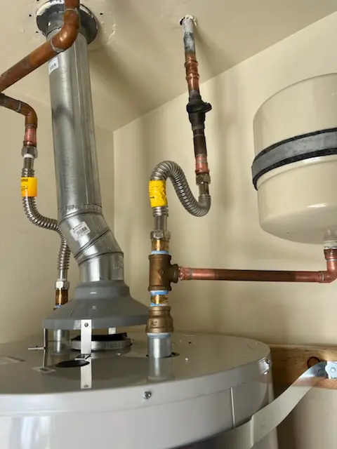 Water heater installation and plumbing repair in Carmody